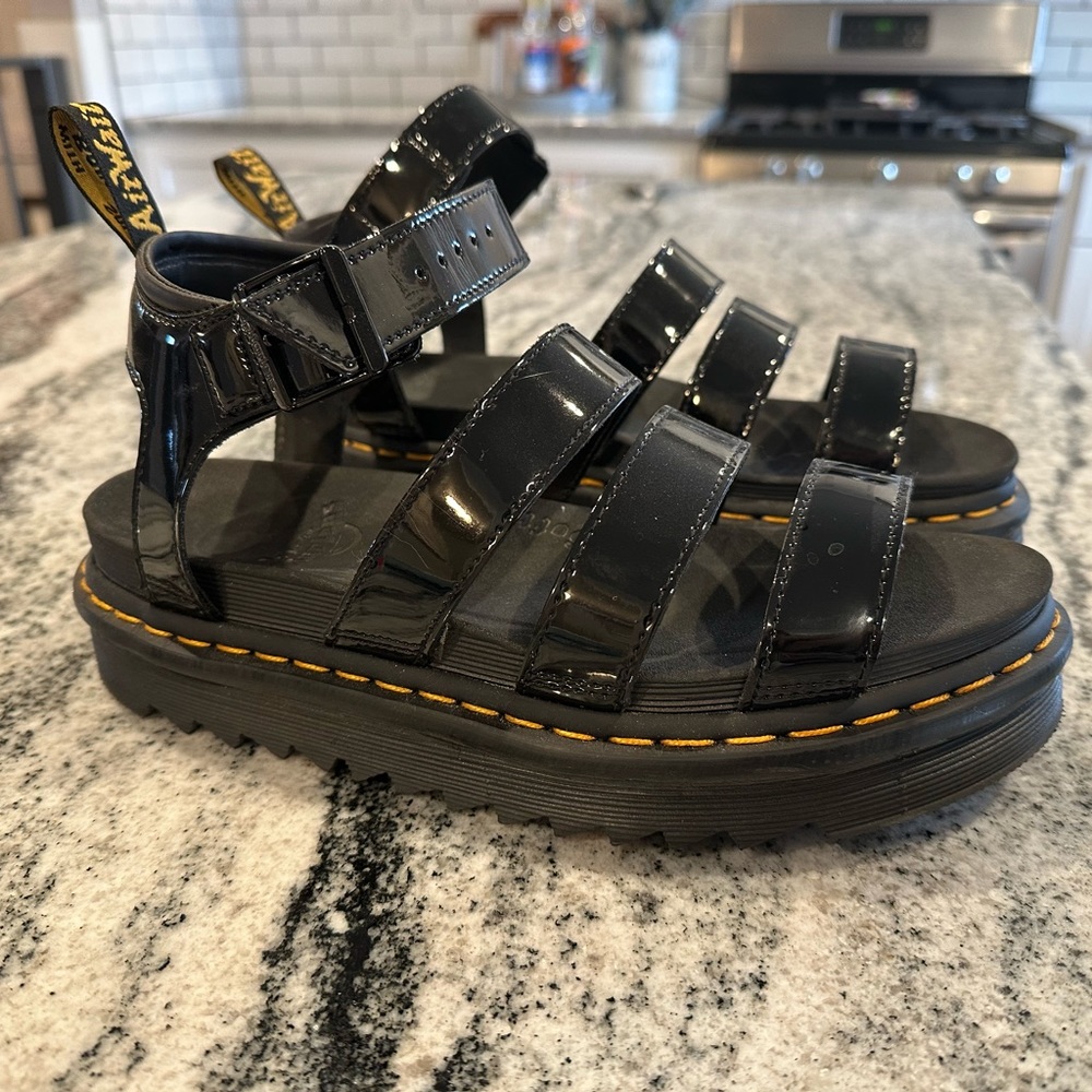 Woman’s Dr. martens sandals .